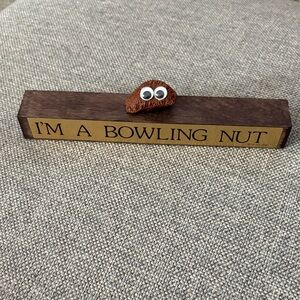 1978 Bowling Nut Wooden Sign with Googly Eyes